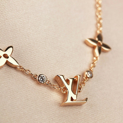 [Legend]STAR AND SUN 7 MOTIFS GOLD BRACELET